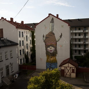 Unusual patterns on the houses of artists team Etam Cru